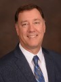 Bruce A. Mueller, Pharm.D., FCCP