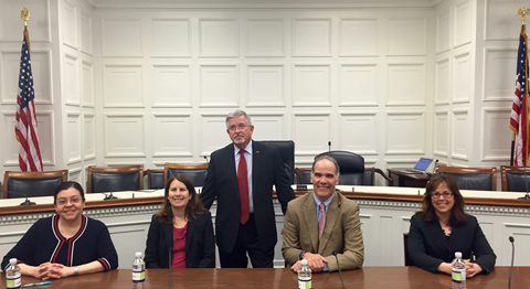 The Briefing Panel seated in the Rayburn House Office Building